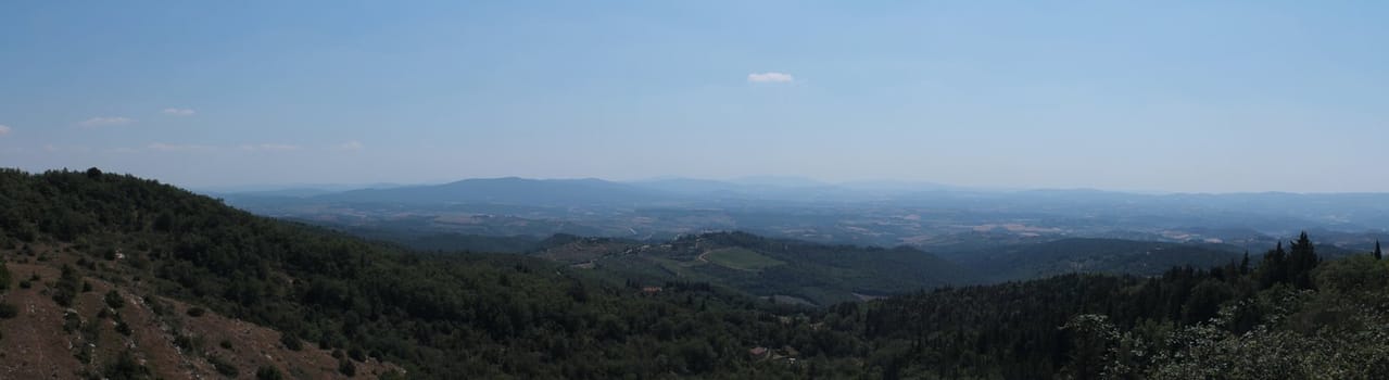 Panoramic view of the Italian countryside in Tuscany. This photo is made attaching together various photos