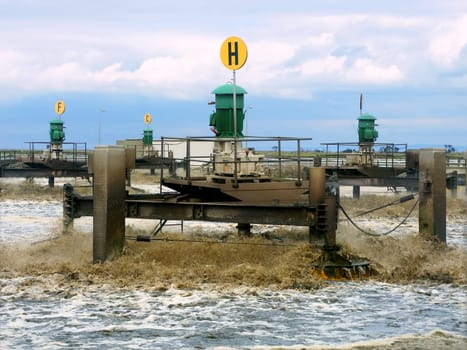 Werribee, Australia - September 23, 2005: Sewage is broken down in a pond at the Western Treatment Plant near Werribee, Australia.  This sewage treatment plant began operating in 1897 and treats a significant portion of Melbourne's sewage.