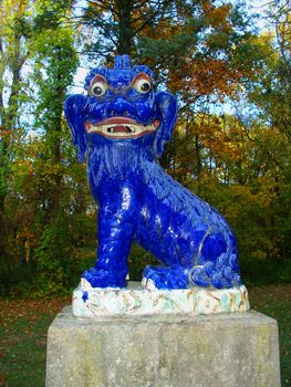 Monticello, IL United States - November 02, 2007: One of many statues in the Fu Dog Garden of the Robert Allerton Park near Monticello, Illinois.  This garden was designed in 1932 and includes 22 Chinese Fu Dog Statues.