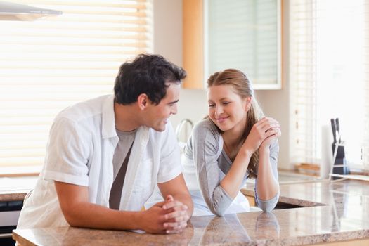 Young couple together in the kitchen