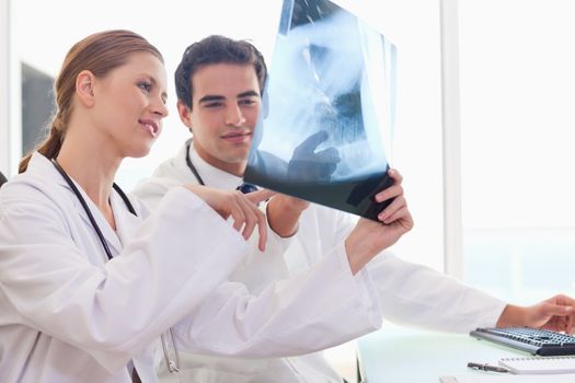 Young doctors talking about an x-ray