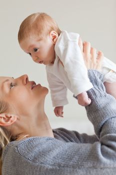 Young mom holding her baby
