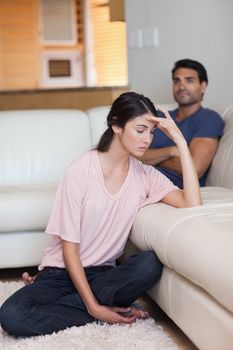 Portrait of a couple after an argument in their living room