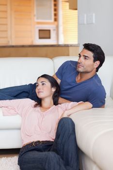 Portrait of a lovely couple posing in their living room