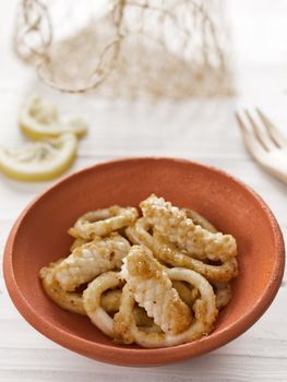 close up of a bowl of calamari fritti