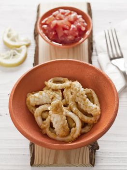 close up of a bowl of calamari fritti