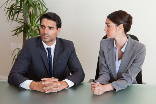 Focused business people negotiating in a meeting room