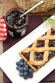 blueberry tarts on wooden table
