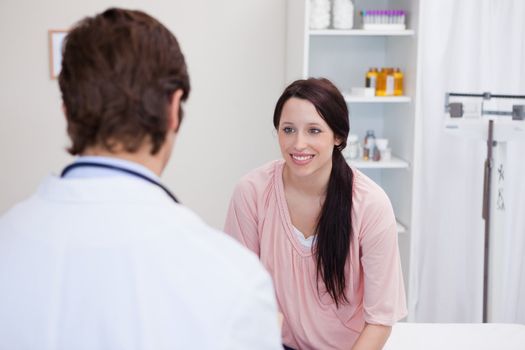 Male doctor has good news for his patient