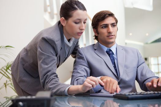 Young business team working on pc together