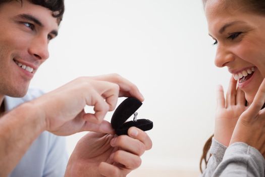Close up of young man making a proposal of marriage