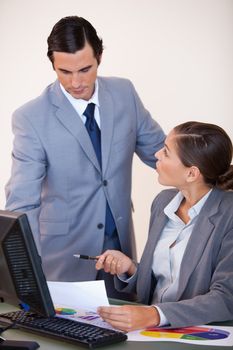 Young businessman talking with his secretary