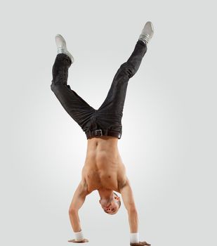 Modern style male dancer jumping and posing. Illustration