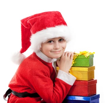 Boy holding a christmas gift isolated on white background