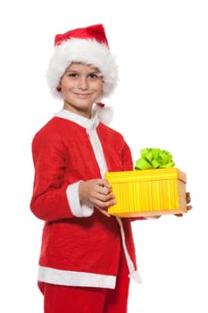 Boy holding a christmas gift isolated on white background