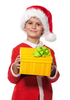 Boy holding a christmas gift isolated on white background