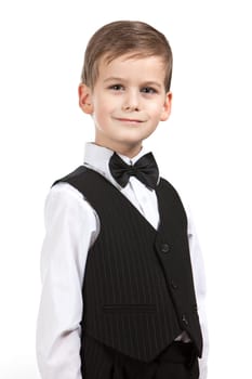 Boy in a suit smiles isolated on white background