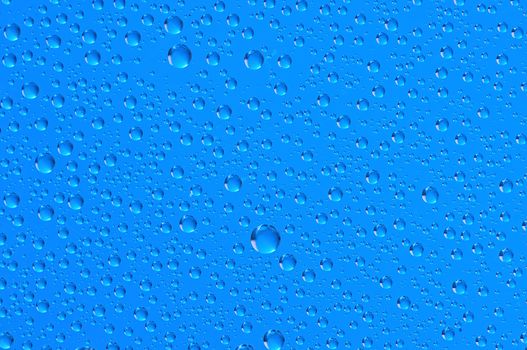 blue water bubbles on the window for background