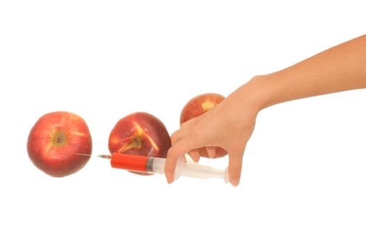 Poison in a syringe is injected into apples