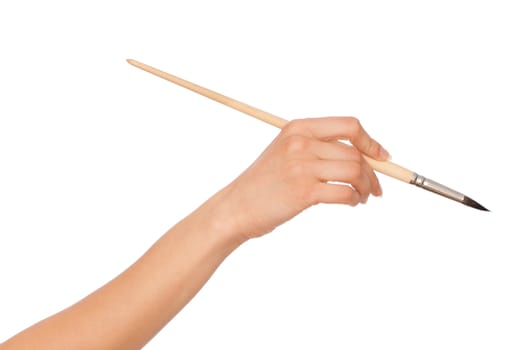 woman drawing a picture with a brush