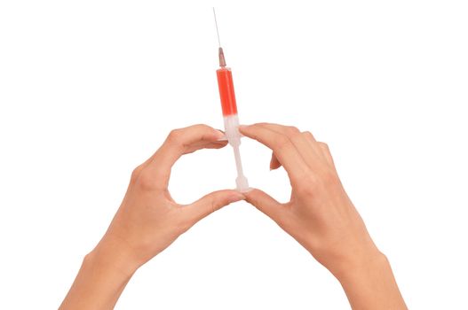 Woman holds in the hand syringe with a new red color antibiotic
