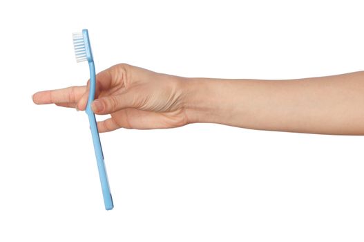 brush for toothpaste at in the girl's hand