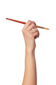 woman paints a picture with a red brush