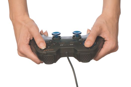 The girl plays a computer game with the help joypad