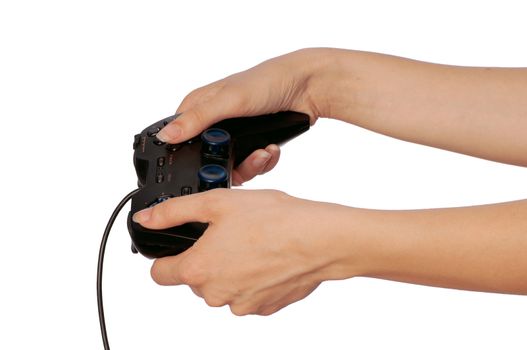 The girl plays a computer game with the help joypad