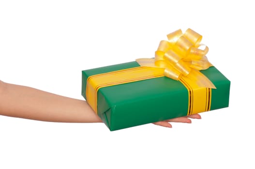woman giving a green box with yellow ribbon as a gift