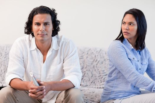 Young couple having a dispute in the living room