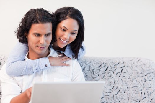 Young couple on the laptop together