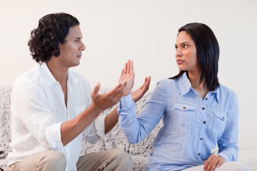 Young male begging his girlfriend for pardon