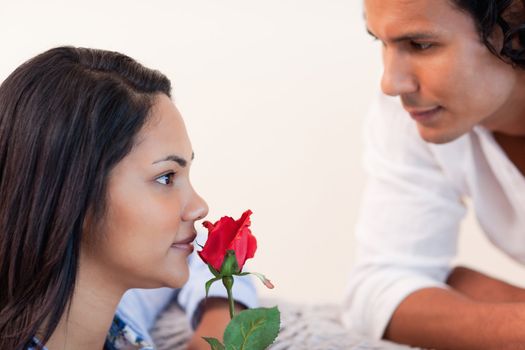 Young male just gave his girlfriend a rose