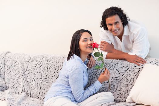 Young couple in the living room together on valentines day