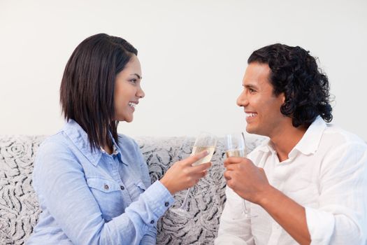 Young couple drinking sparkling wine