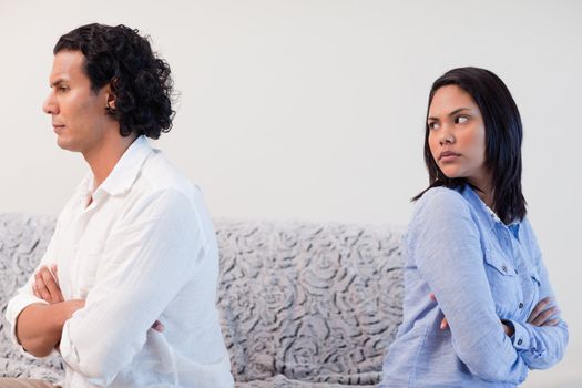 Young couple having an argument in the living room