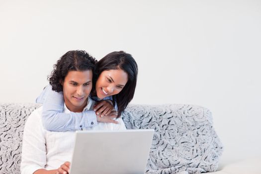 Young couple spending time online