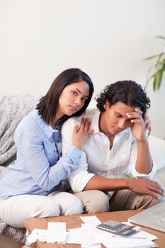 Young couple frustrated by their expenses