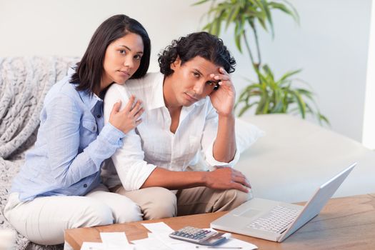 Frustrated young couple underestimated their spending