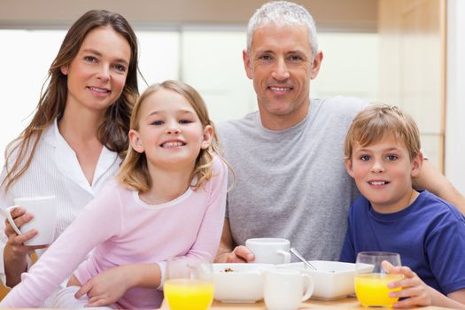 Family having breakfast in their kitchen