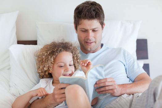 Father reading a story for his child