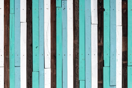 Abstract background of colorful wood texture.