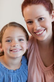 Happy smiling mother and daughter