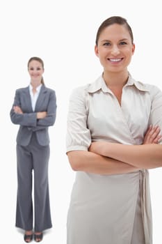 Portrait of smiling businesswomen posing against a white background