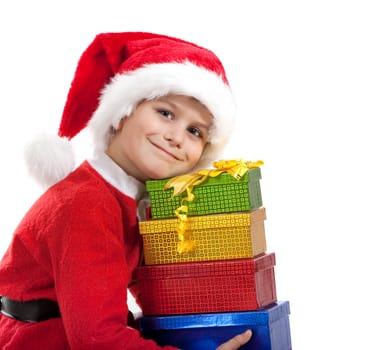 Boy holding a christmas gift isolated on white background