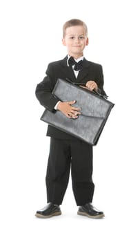 Boy holding a briefcase isolated on white background