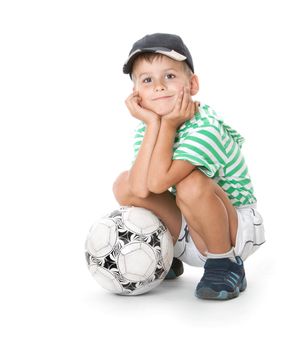 Boy holding soccer ball isolated on white background