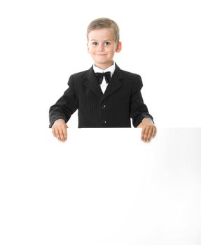 Boy holding a banner isolated on white background