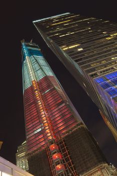 NEW YORK CITY - SEPTEMBER 17: One World Trade Center (known as the Freedom Tower) is shown under new  illumination on September 17, 2012 in New York, New York.